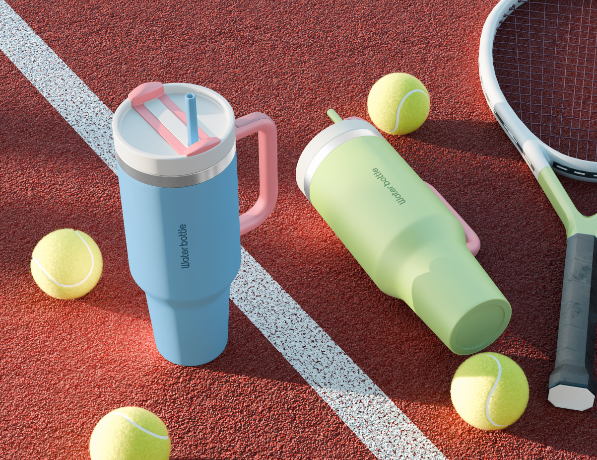 Two water bottles, a tennis racket, and tennis balls on a tennis court.