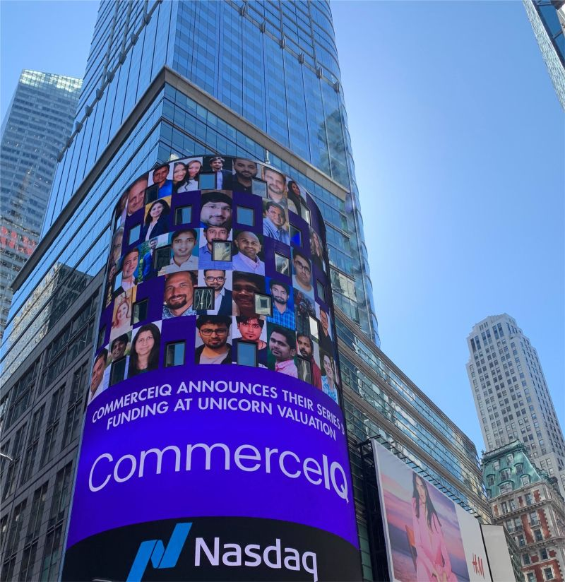 Nasdaq billboard featuring CommerceIQ team photos and announcement of new funding