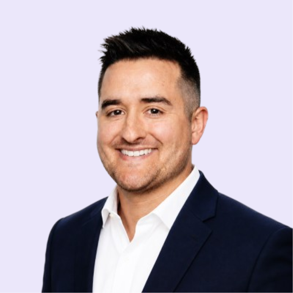 Collin Napier, smiling in a business suit