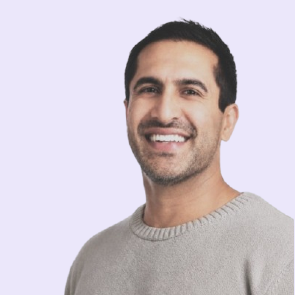 A headshot of Katen Johal smiling at the camera
