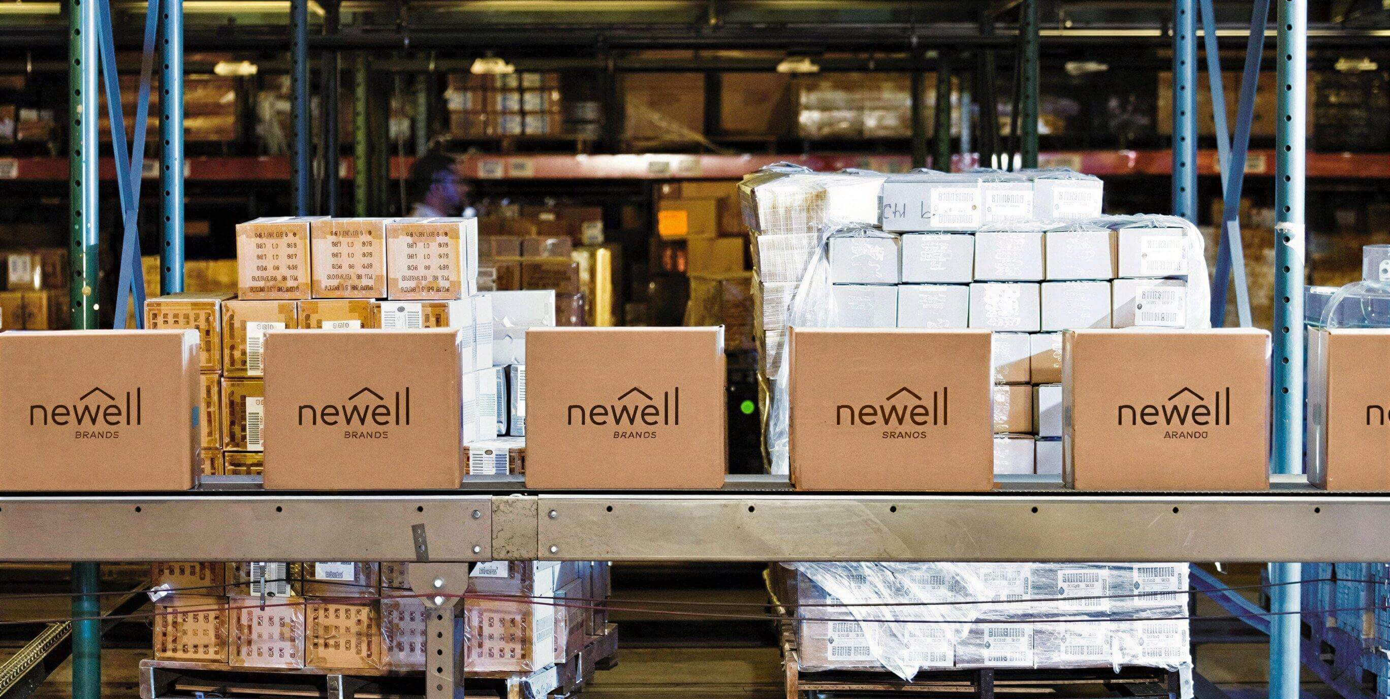 Newell Brands boxes on a warehouse shelf with other boxes in the background.